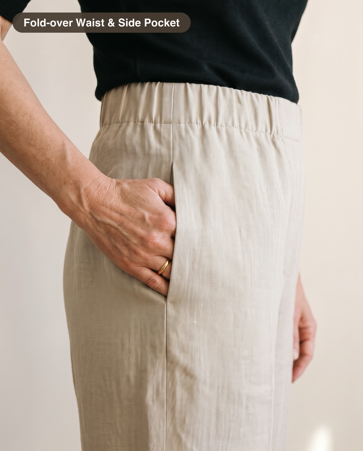 Close-up of the fold-over elastic waist and side seam pocket